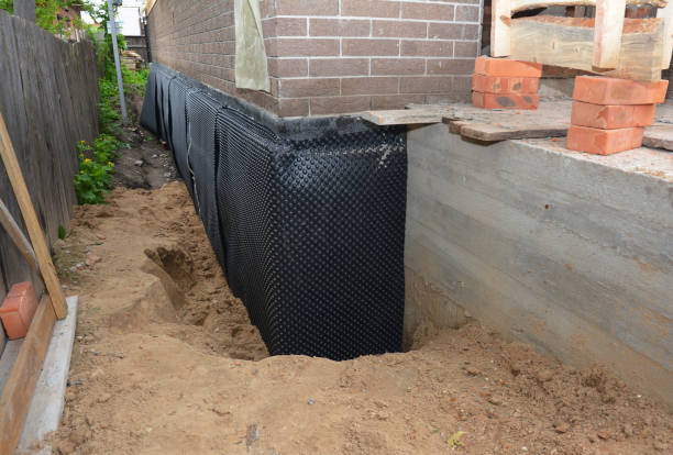 SJ Waterproofing Pros technician performing targeted Emergency Waterproofing assessment in Waynesboro, TN